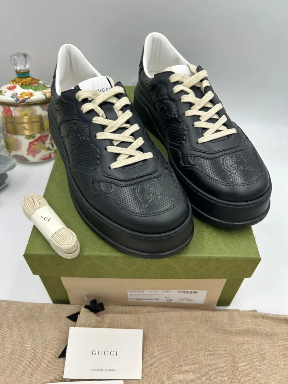 Men’s Gucci GG Embossed Leather Sneakers.  Size 9.5.(fits 10.5). Made in Italy.